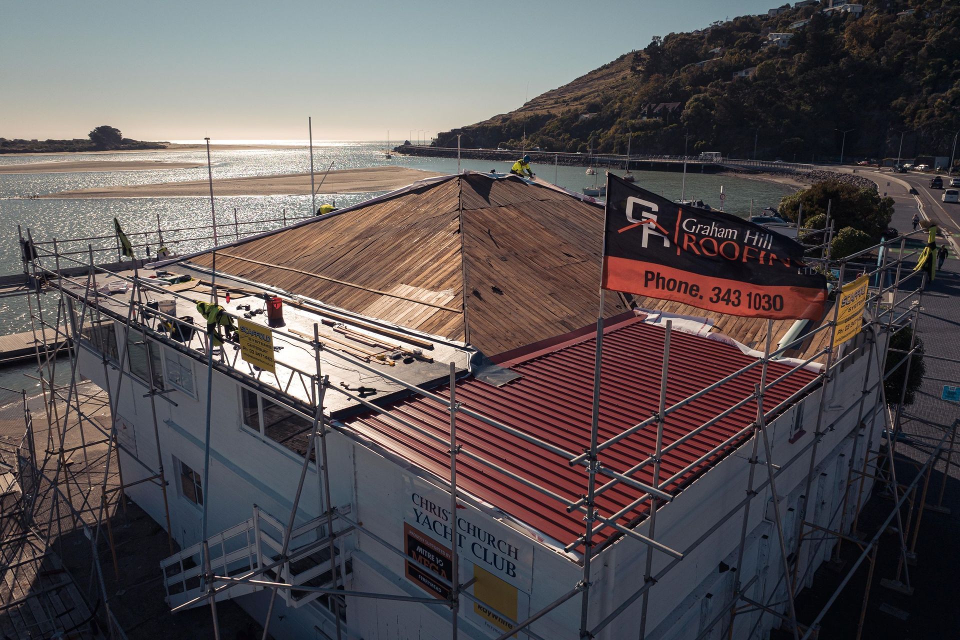 The reroofing of the Christchurch Yacht Club gets underway. | Photography: James Munro from Itch.