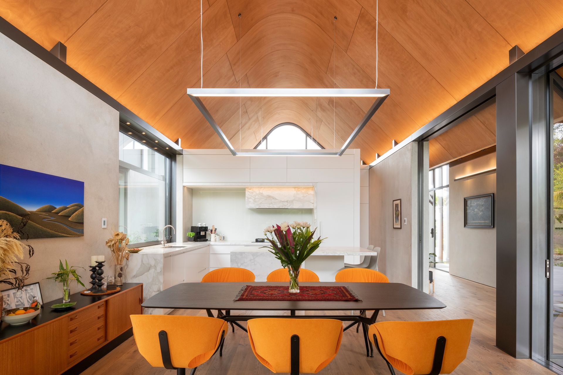 “We always knew that the main focus from an interior point of view was the ceiling shape,” says Craig. “So it was all about lighting the ceiling.” The Manta dining table is from Matisse.