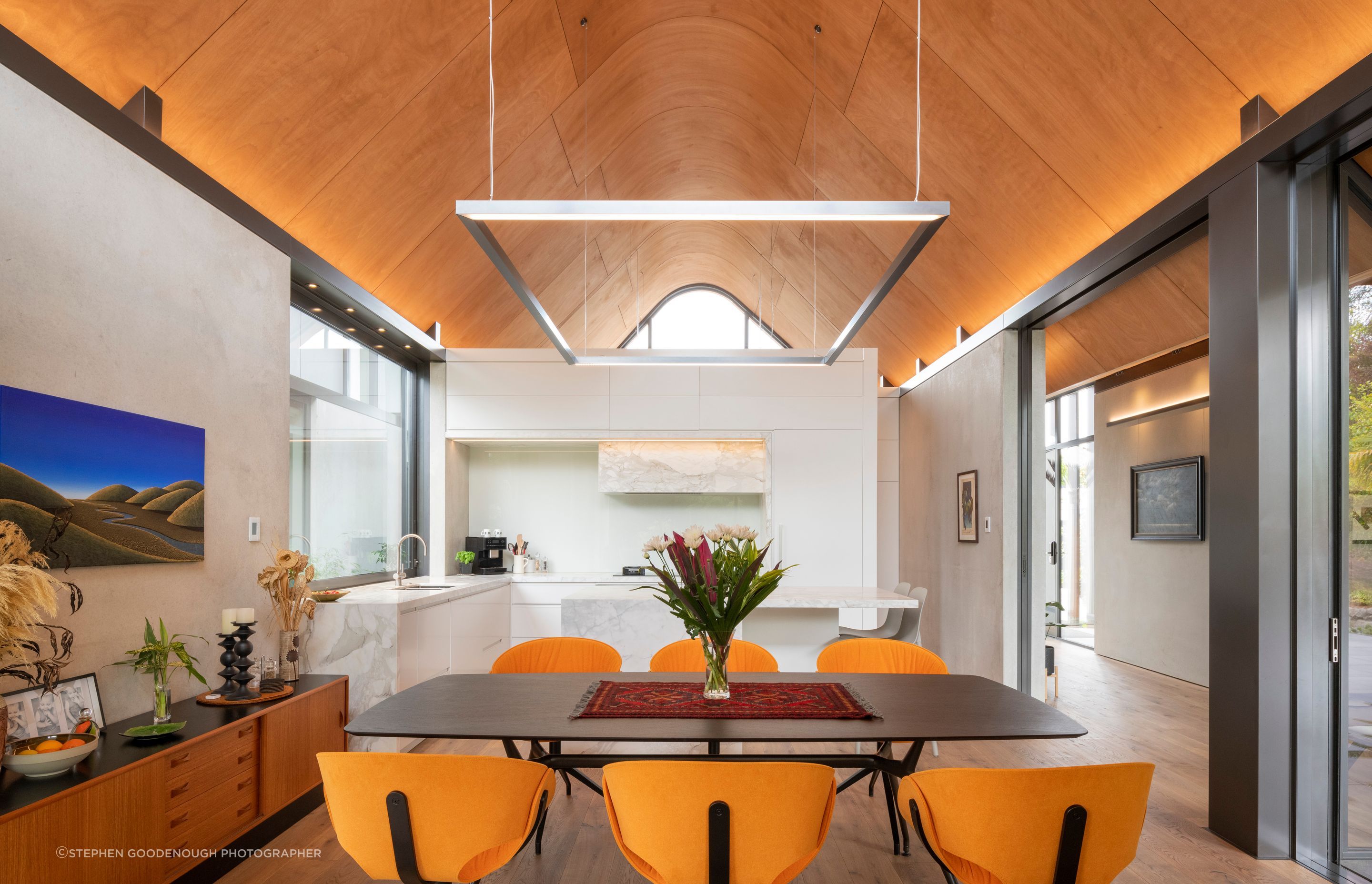 “We always knew that the main focus from an interior point of view was the ceiling shape,” says Craig. “So it was all about lighting the ceiling.” The Manta dining table is from Matisse.