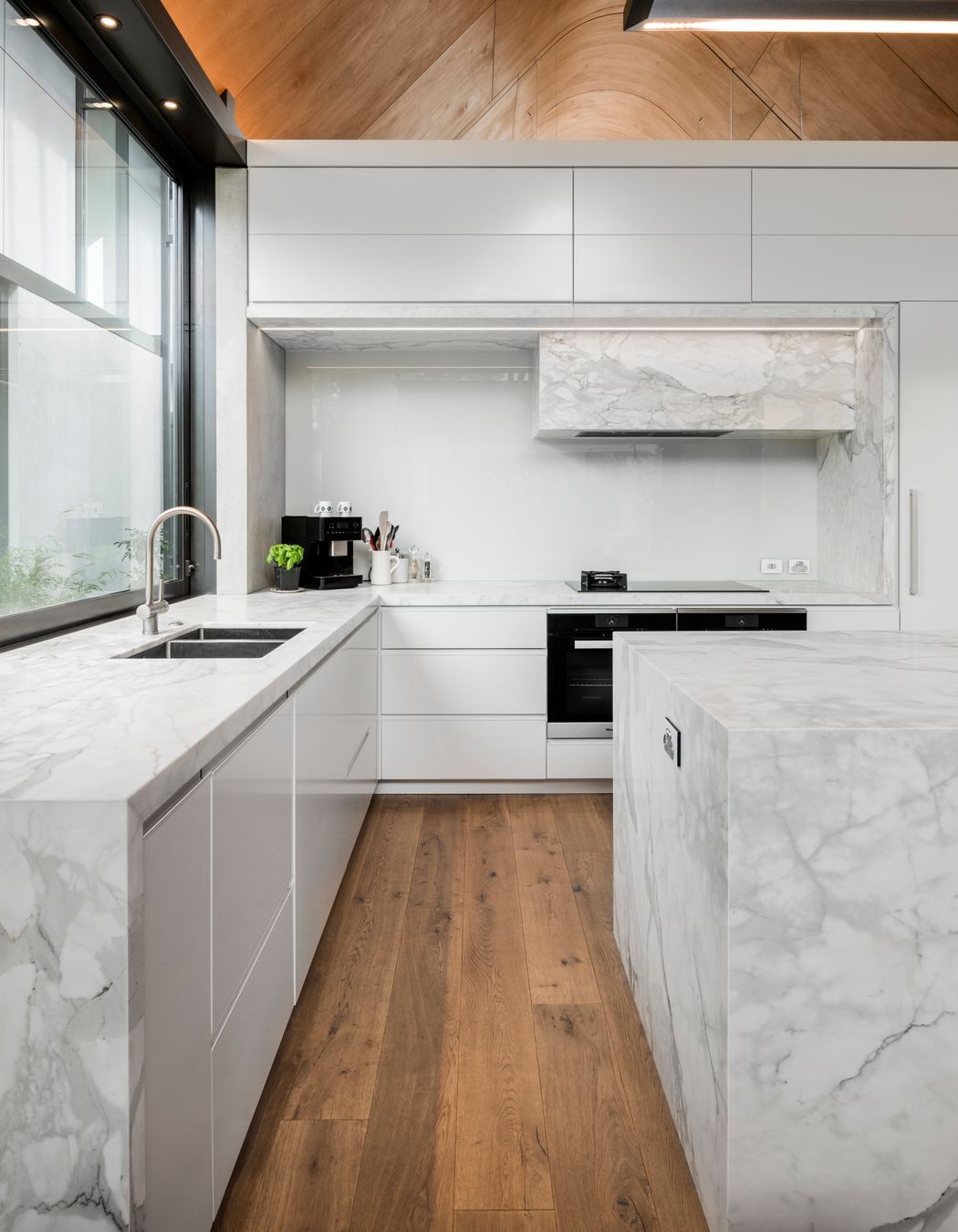 South Architects designed many of the internal features including the kitchen and scullery. “None of the spaces are massive but they all feel right,” says Craig. The tap ware is from Robertson Bathware.