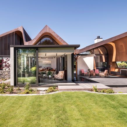 Avant-garde waves of concrete and copper in a new-build Christchurch home