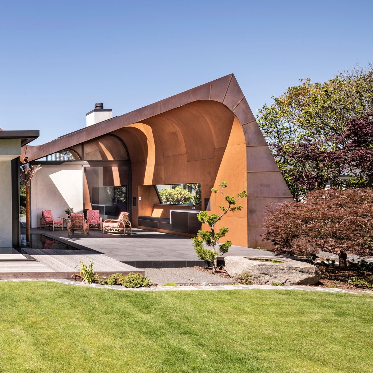 Avant-garde waves of concrete and copper in a new-build Christchurch home
