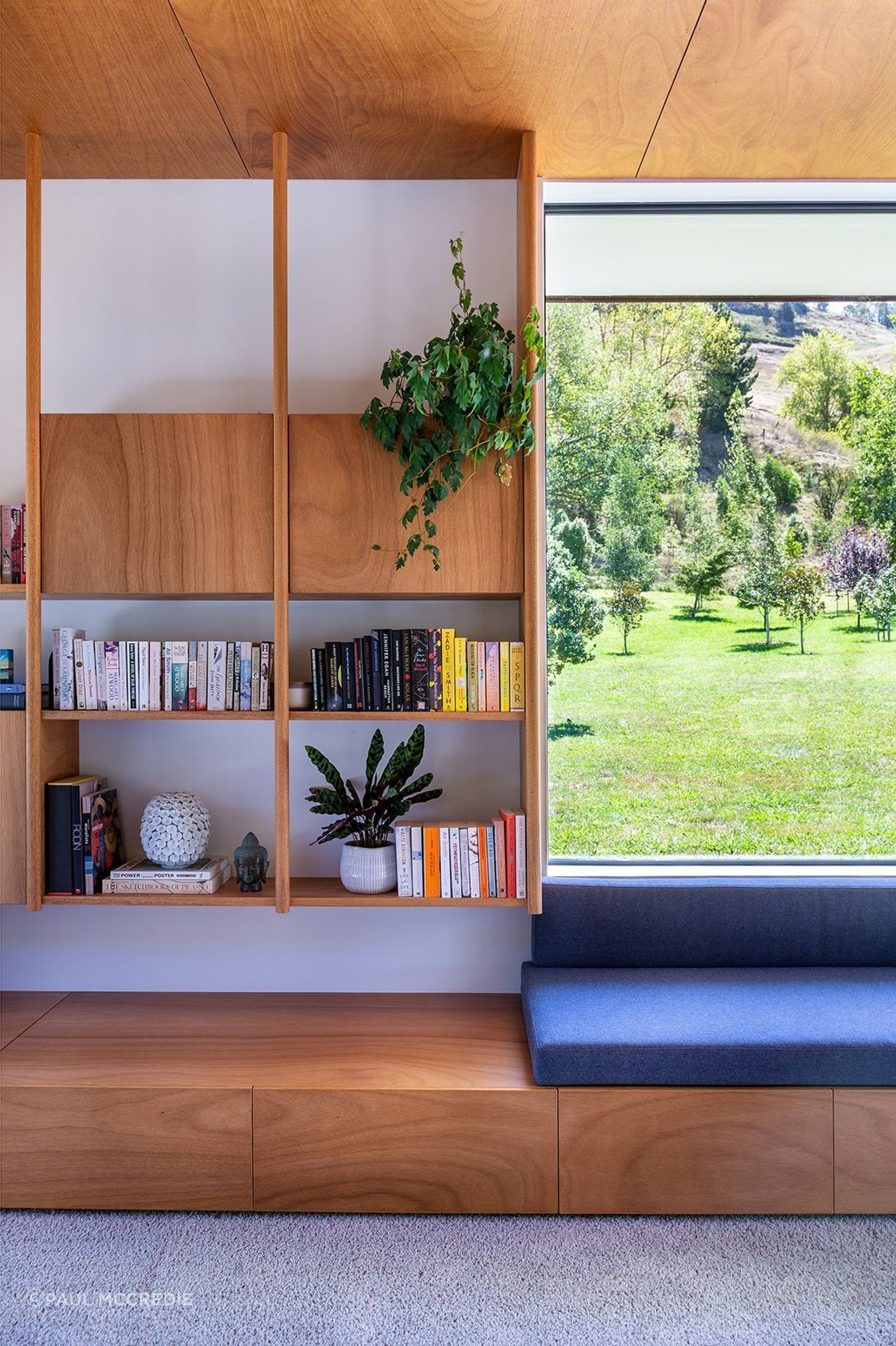 Two further living spaces extend from the kitchen, designed to be flexible in their usage.