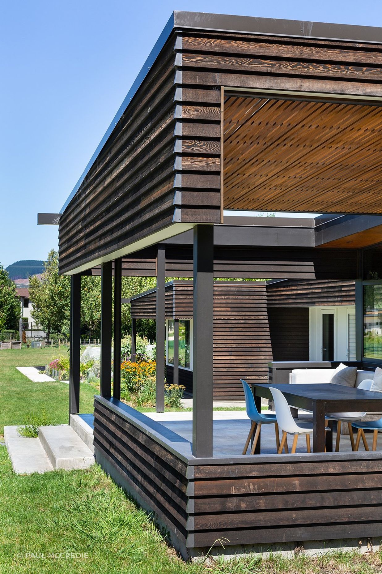 This outdoor space connects the interior and exterior spaces whilst providing shade.