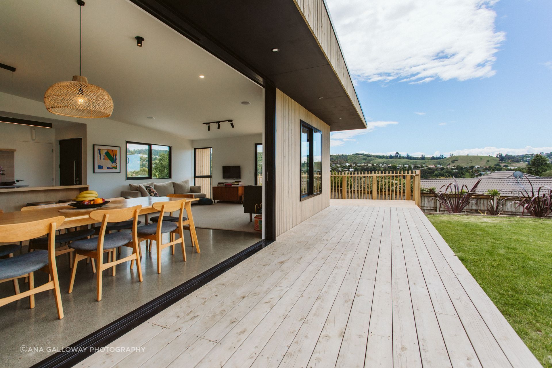 Generous sliding doors connect the living area to the deck.