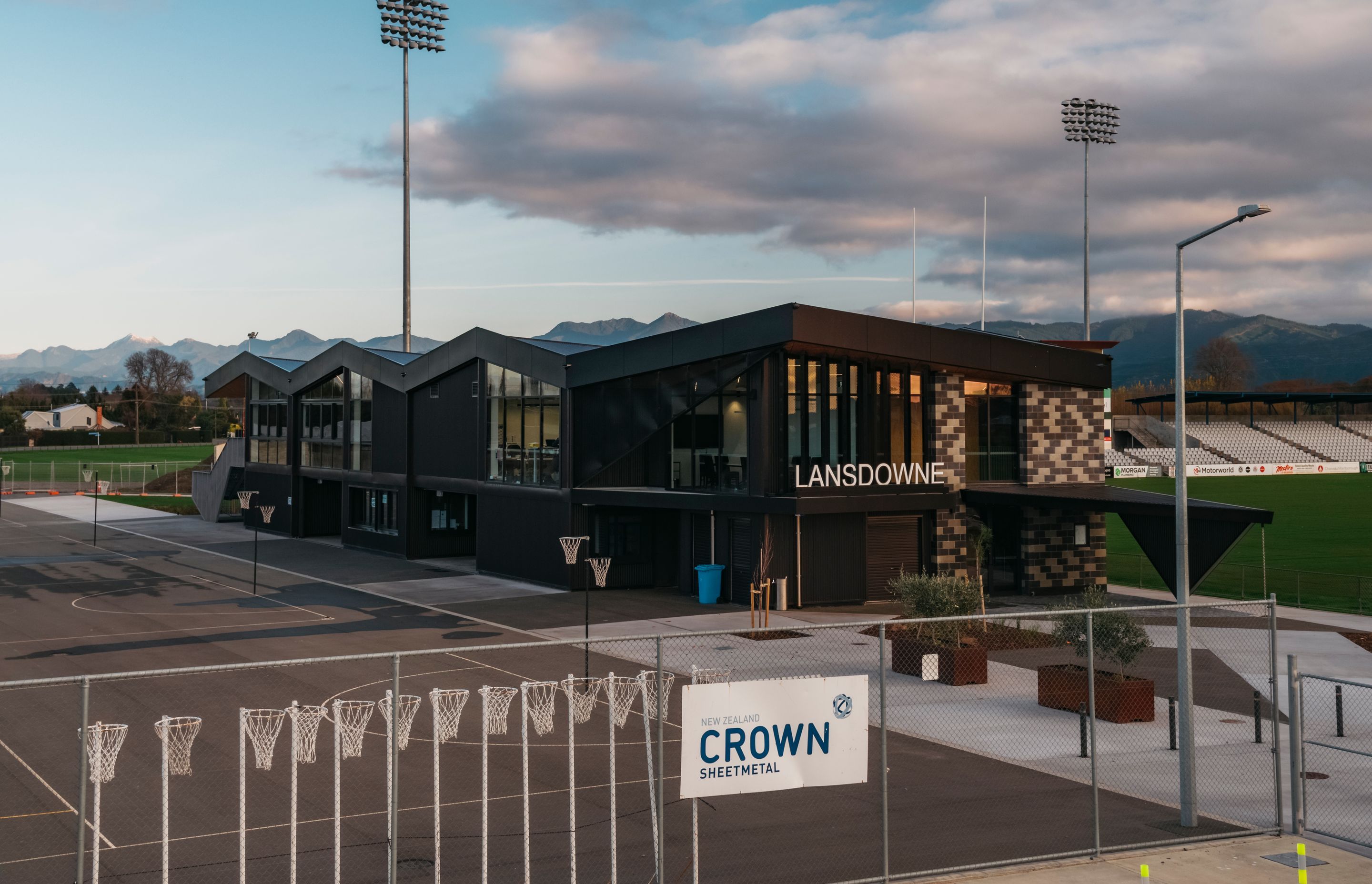 The Richmond Ranges and Wither Hills in the background are reflected in the folded roof form.