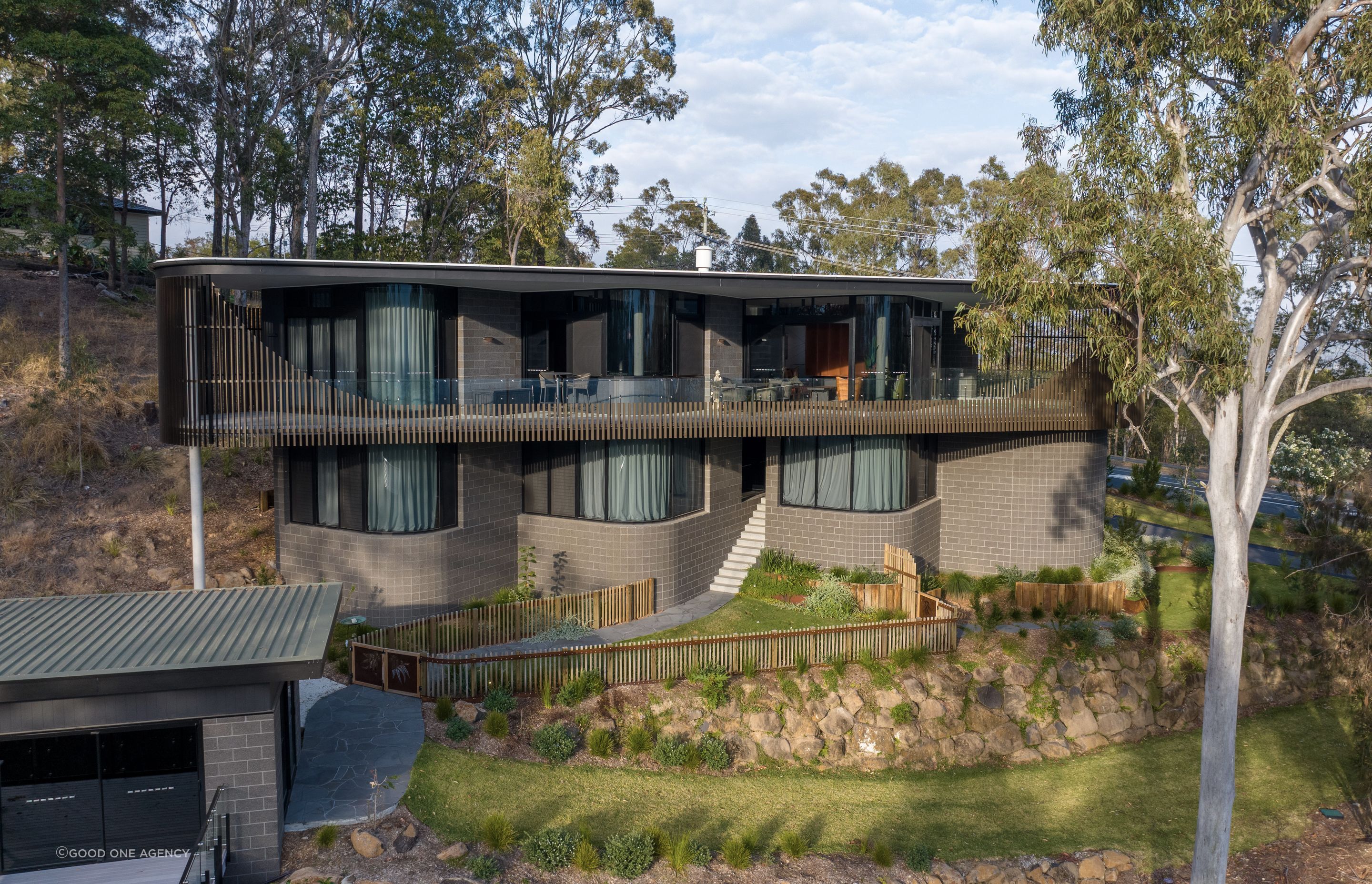 The art studio (on the left) takes in the sculptural view of the home as inspiration.