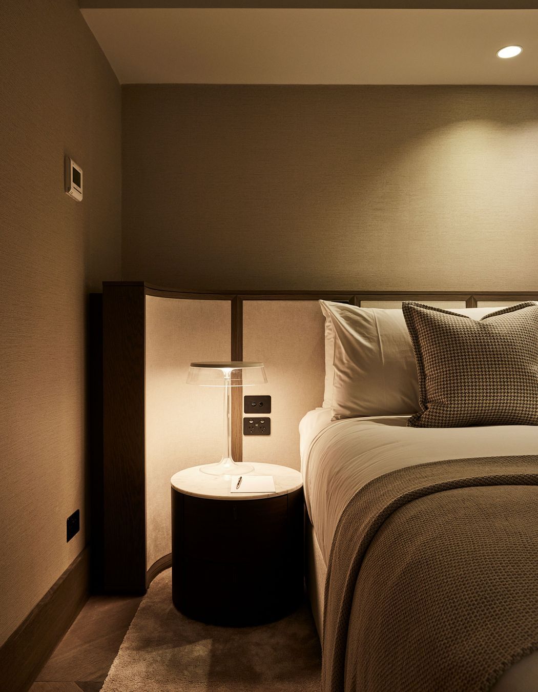 Attention to detail was paramount in the hotel's suites, with parquet flooring, bespoke oak furniture with gold detailing and layers of soft furnishings to evoke that luxury feel.