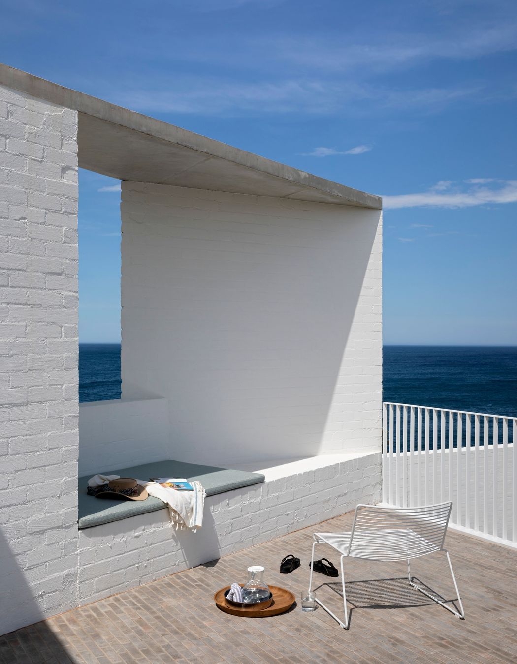 The generous terrace on the top floor features a built in daybed where the owner can enjoy the warm sunny days.