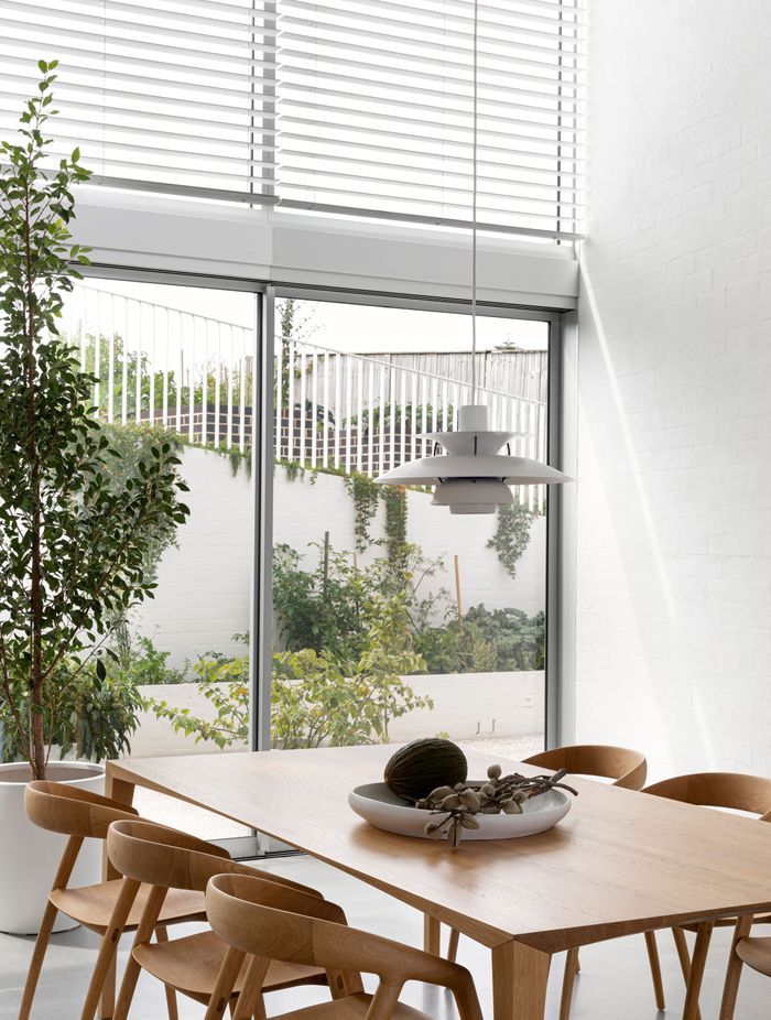 At the rear of the dining space a sheltered courtyard contains a kitchen garden, which can also be accessed by the guest suite.