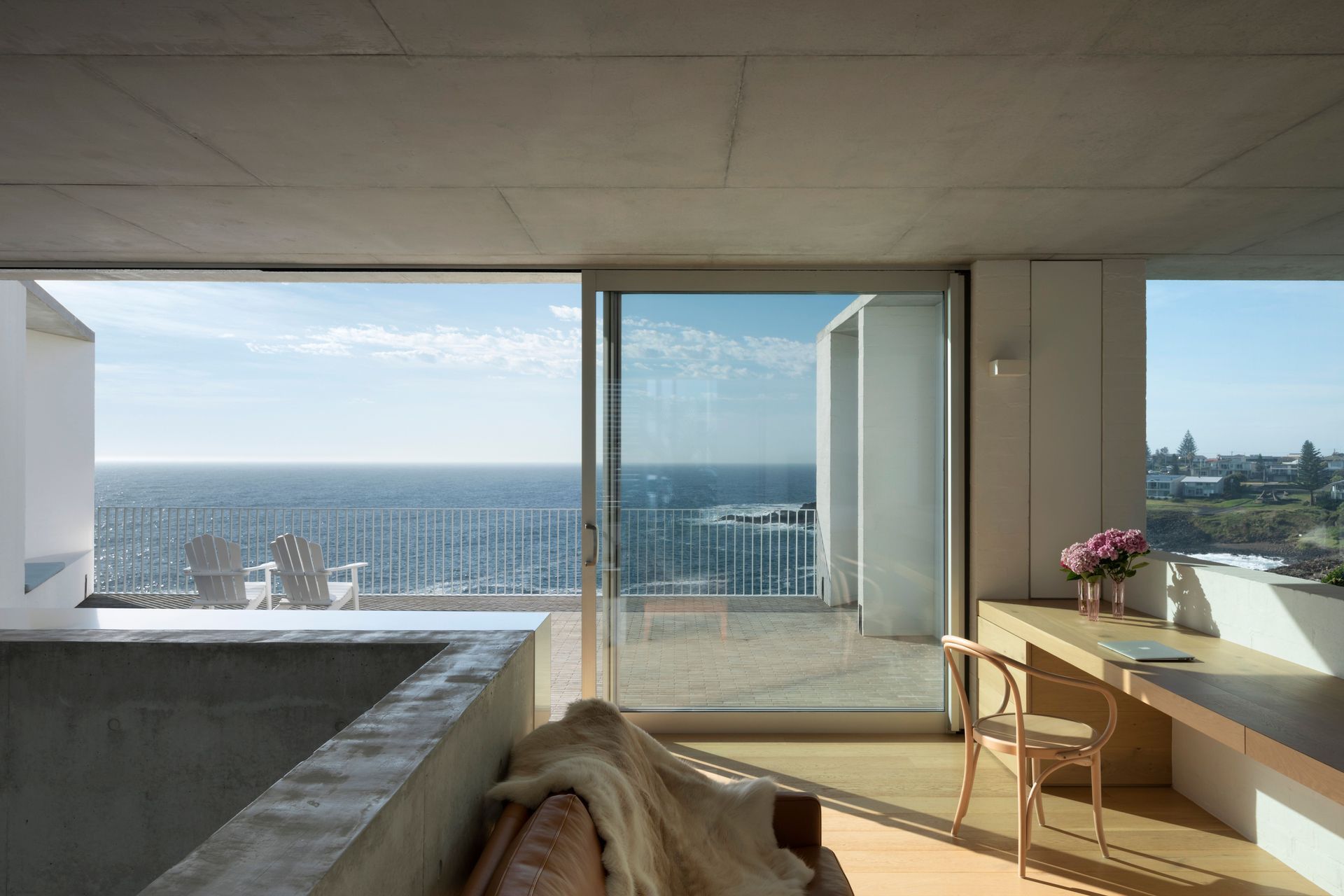 Upstairs a built-in study space leads out to a sheltered terrace.