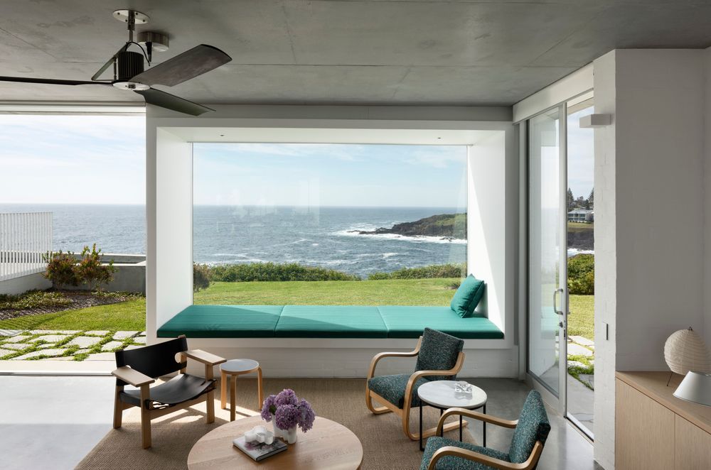In the sunken lounge a built-in daybed is the perfect spot to enjoy the wild storms that frequently pass through.