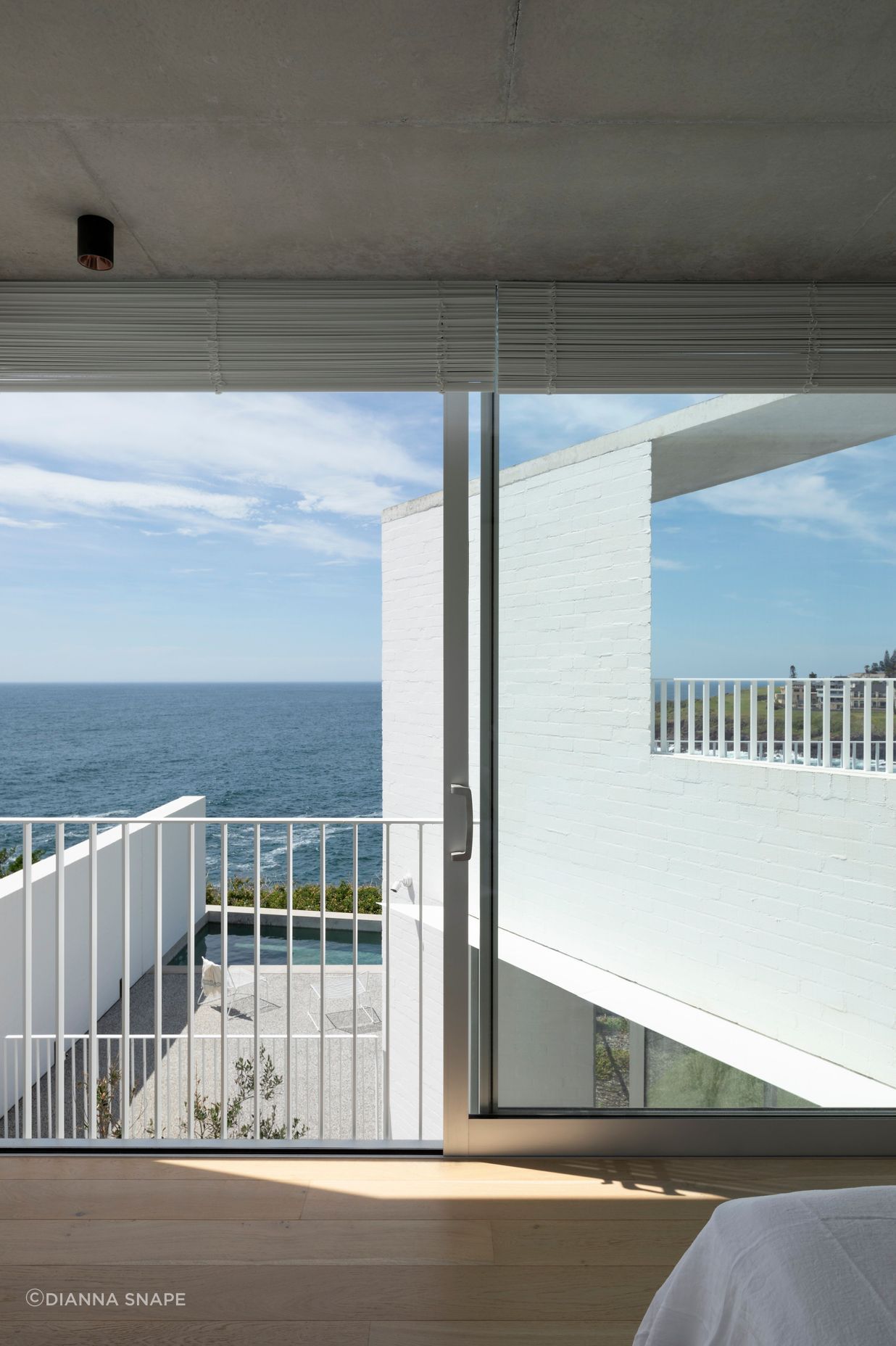 A Juliet balcony in the master bedroom allows air to flow through the upper floor.
