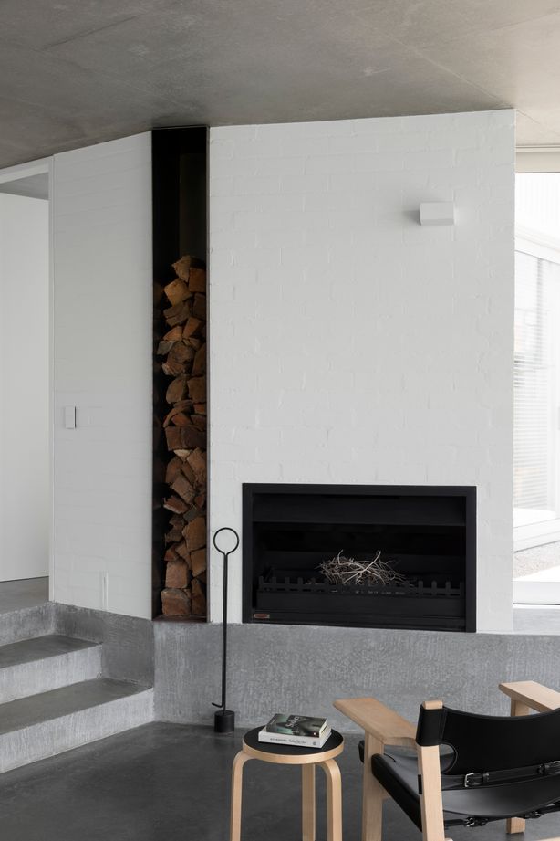 The fireplace in the sunken lounge is a favourite spot to relax.