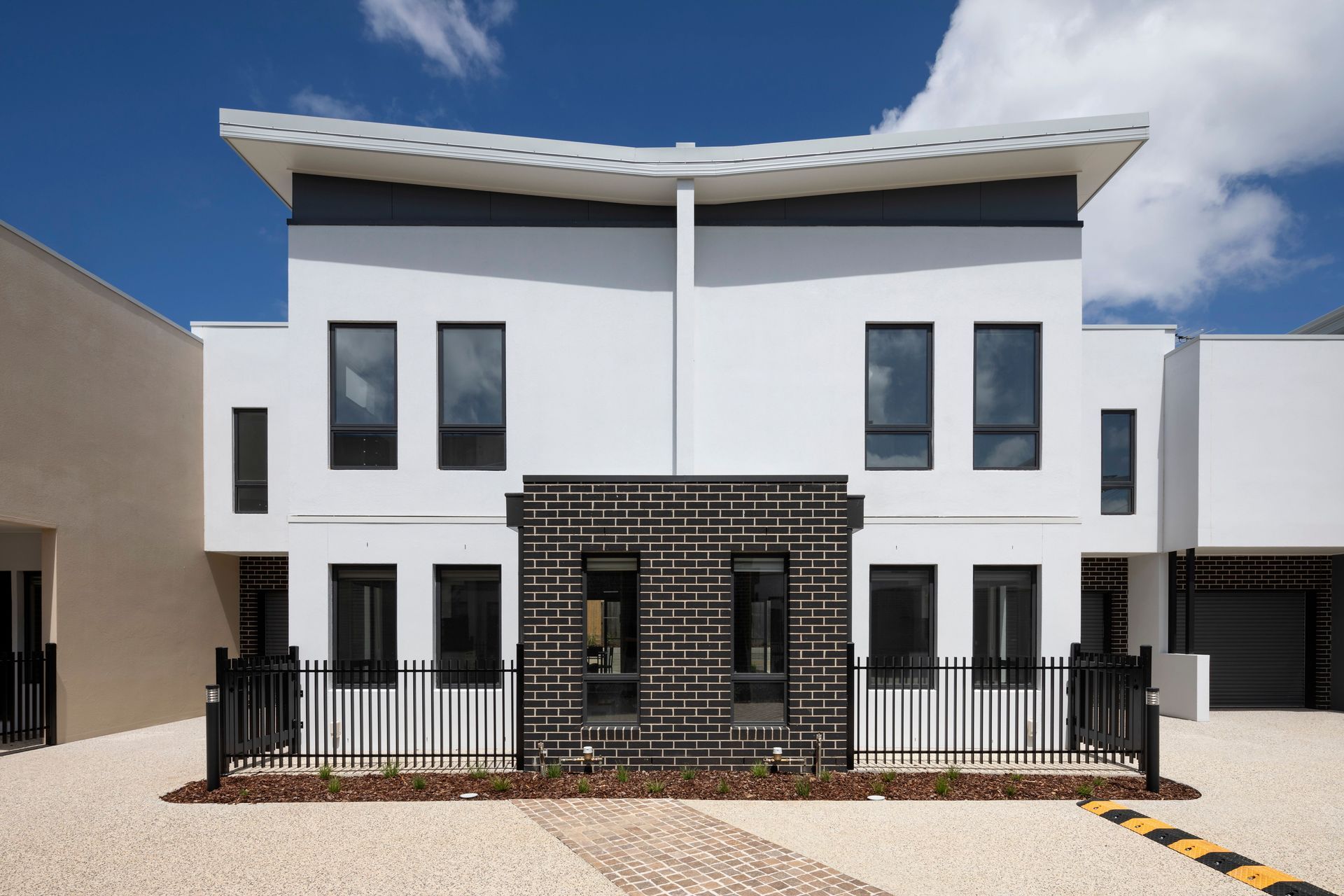 Social housing has to meet disability access standards, which means designs must include features like step-free access, elevators, and doorways wide enough for wheelchair users.