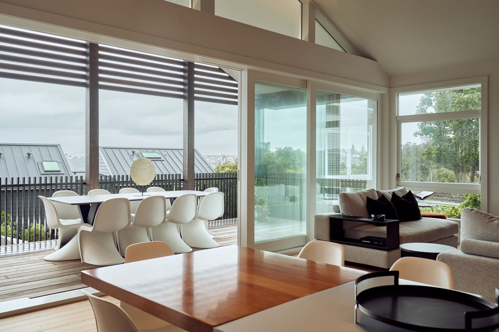 The living and dining now flows out seamlessly to a covered deck.