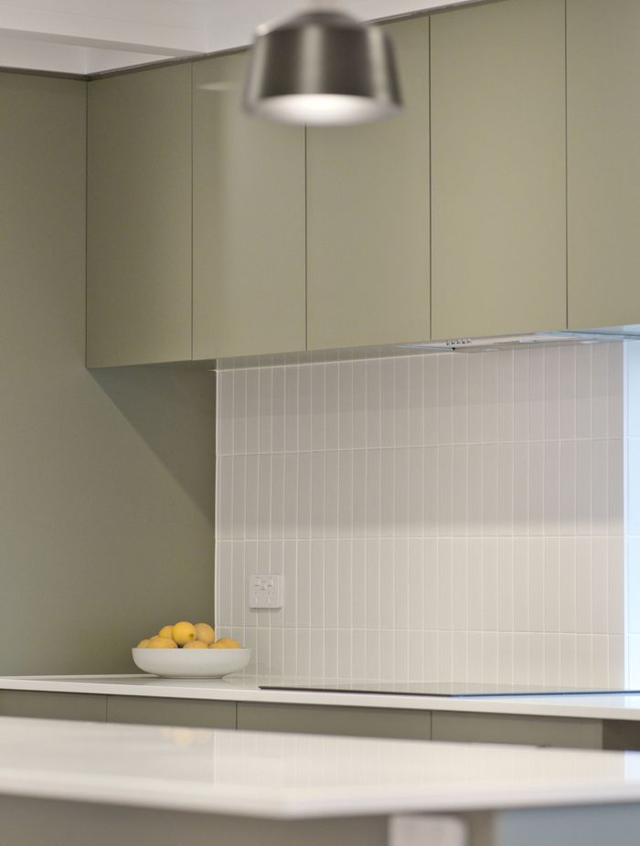 "Many of the other projects we’ve completed recently have had Hamptons-style kitchens with white shaker profile cupboards and drawers, but these homeowners have done something a little bit different which is great to see."