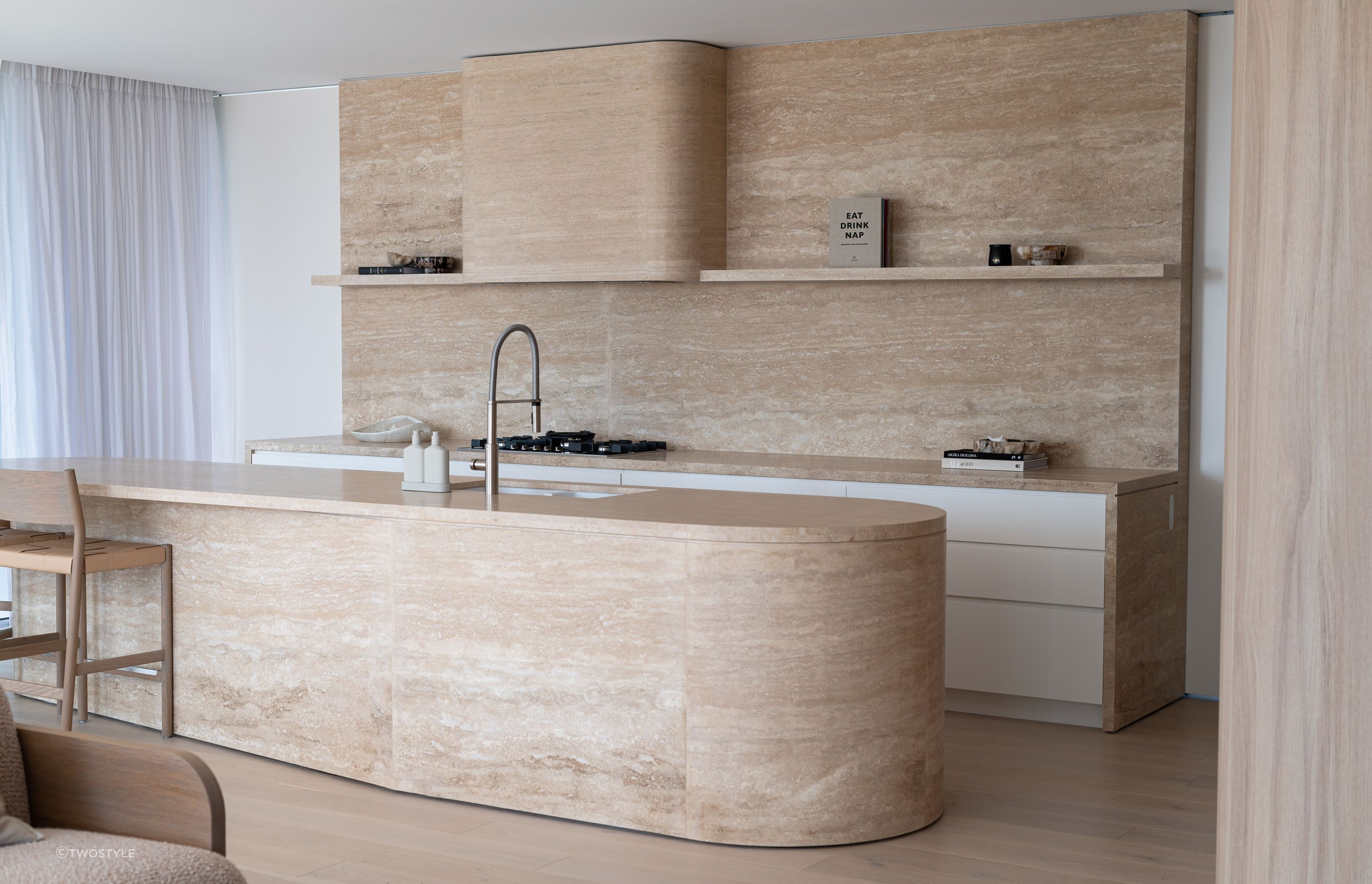 Neutral tones and curves for modern kitchens.