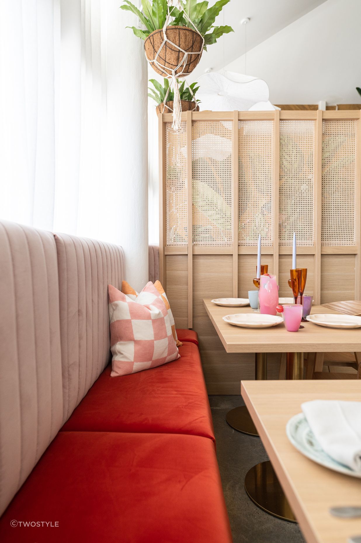 Burnt amber seating adds a touch of drama.