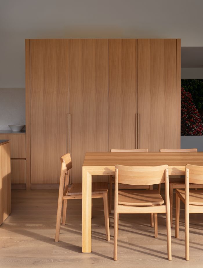 The understated interior finishes help amplify the natural light that floods the space.