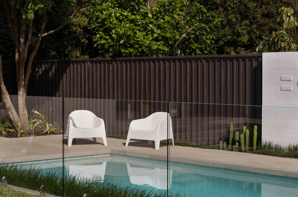 The new pool area and pool house gives the home a resort-like vibe.