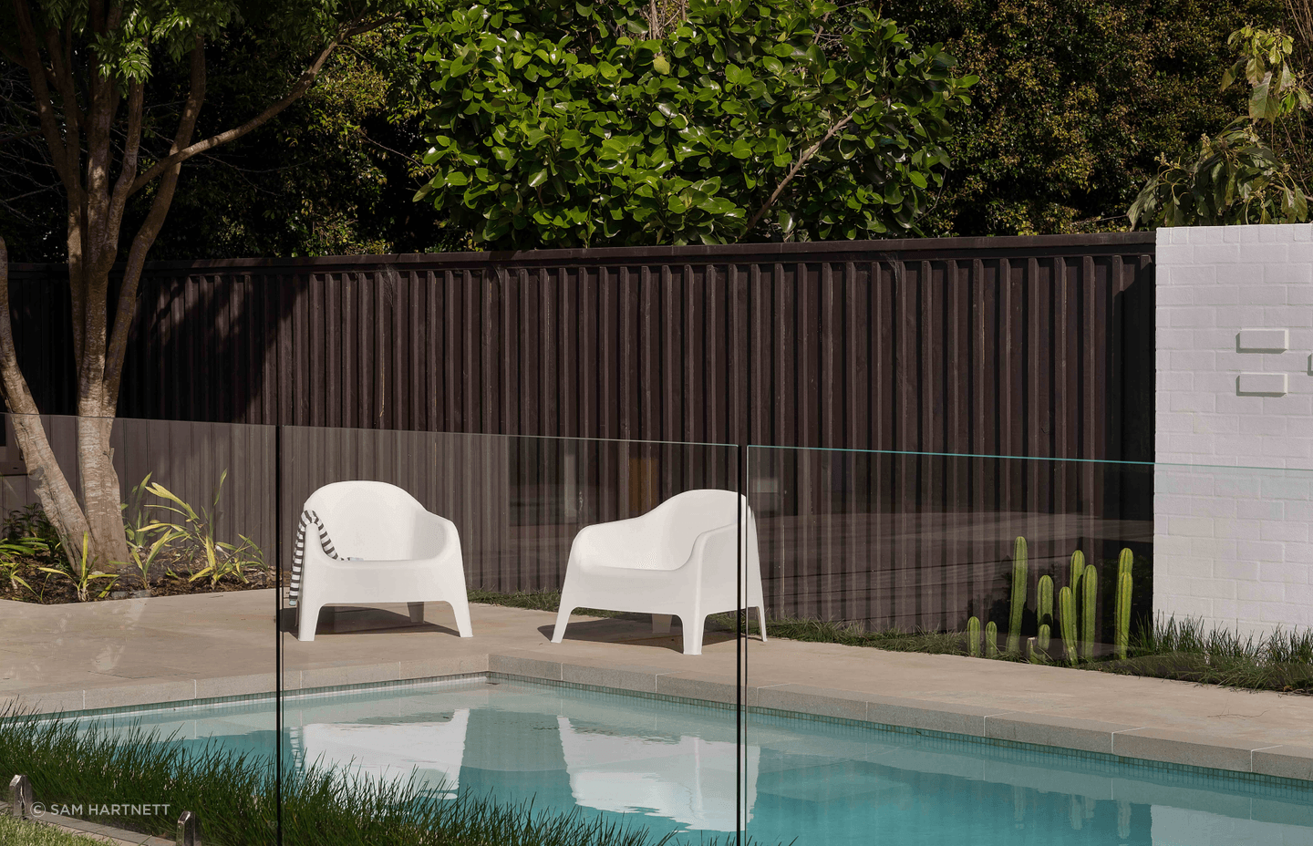 The new pool area and pool house gives the home a resort-like vibe.