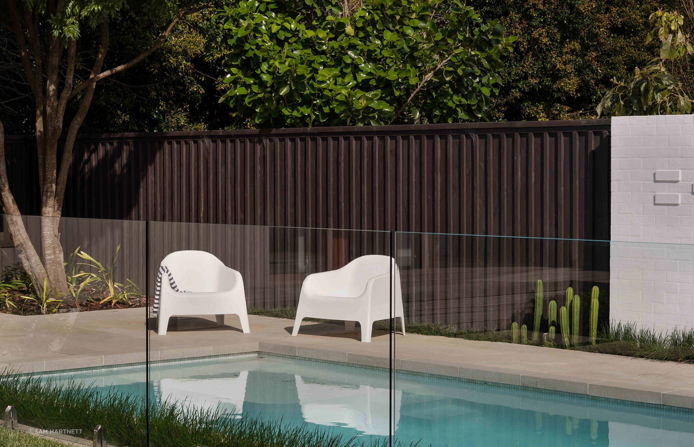 The new pool area and pool house gives the home a resort-like vibe.