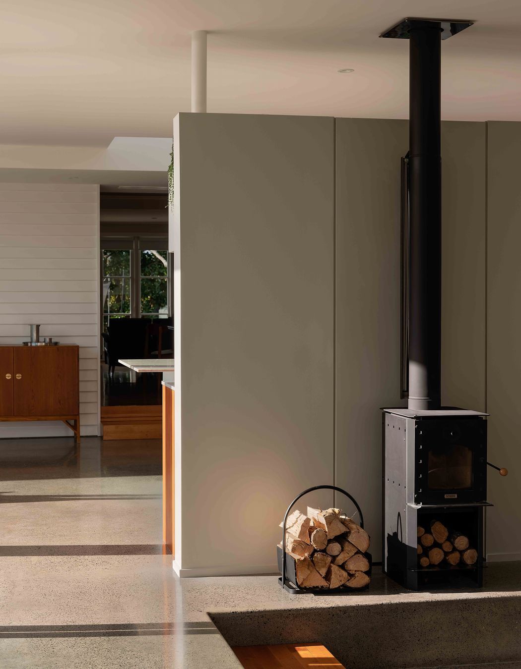 The lounge sits back to back with the kitchen and features a sunken conversation pit.