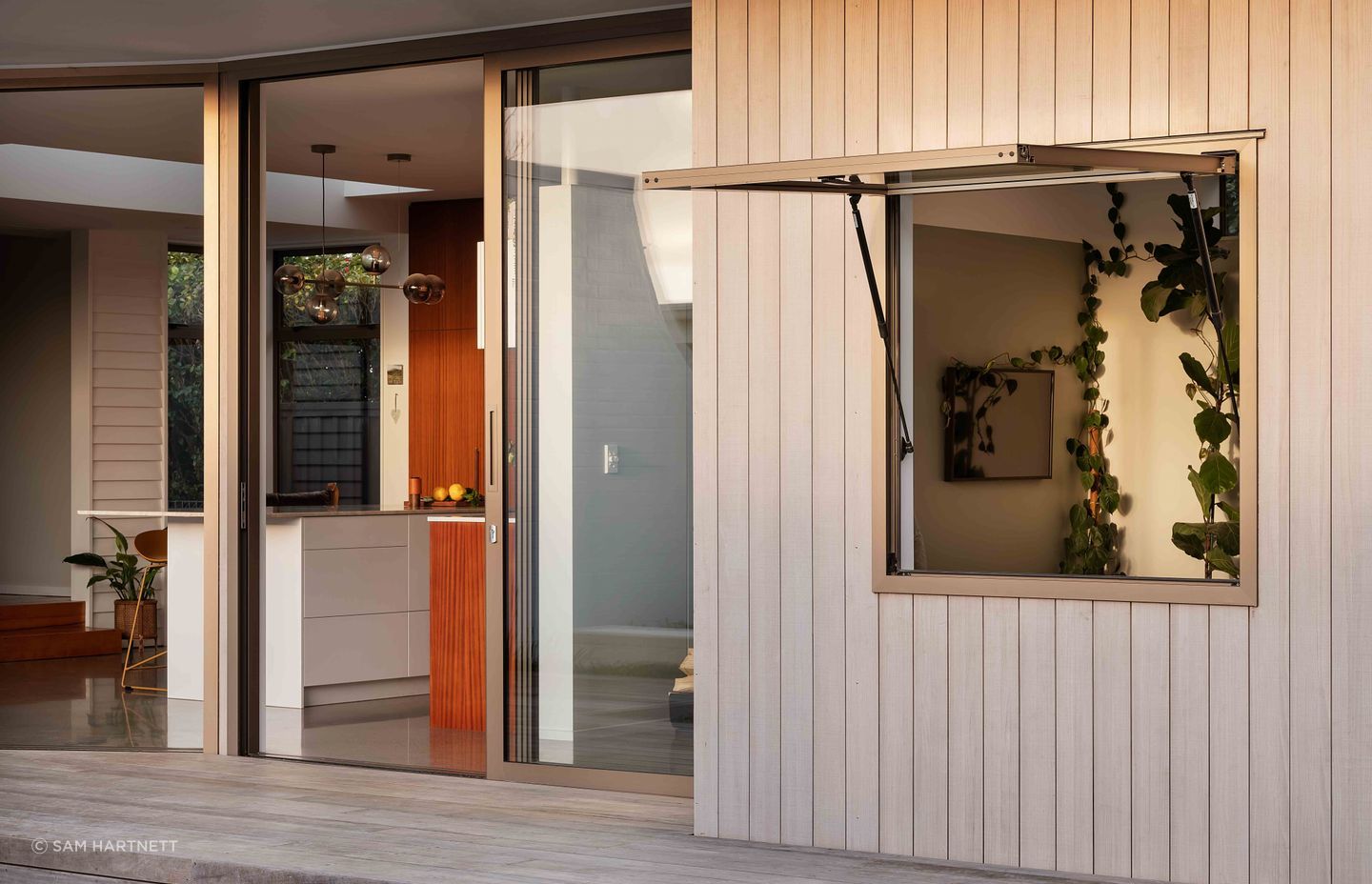 There's excellent indoor/outdoor flow through full-height joinery.