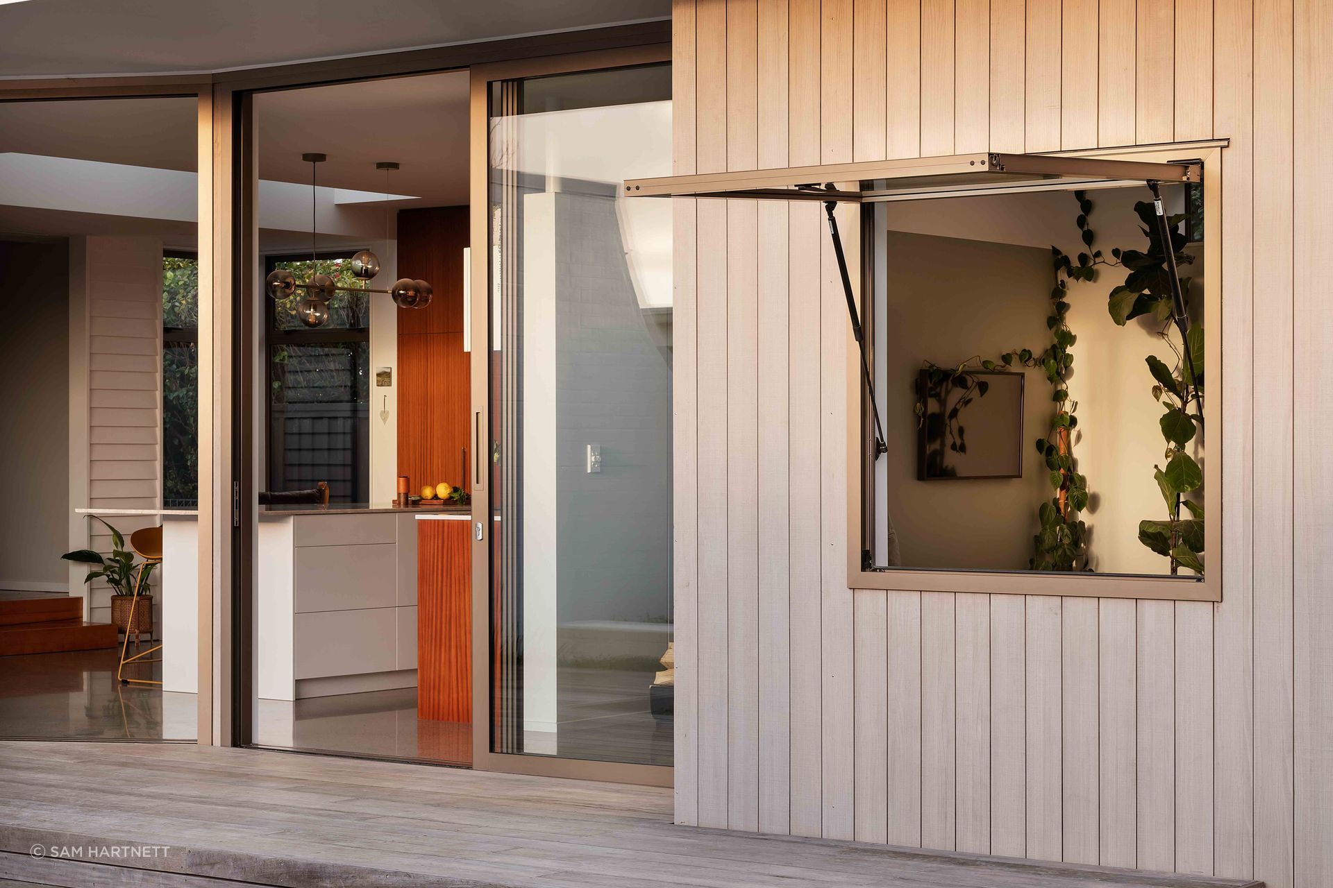 There's excellent indoor/outdoor flow through full-height joinery.