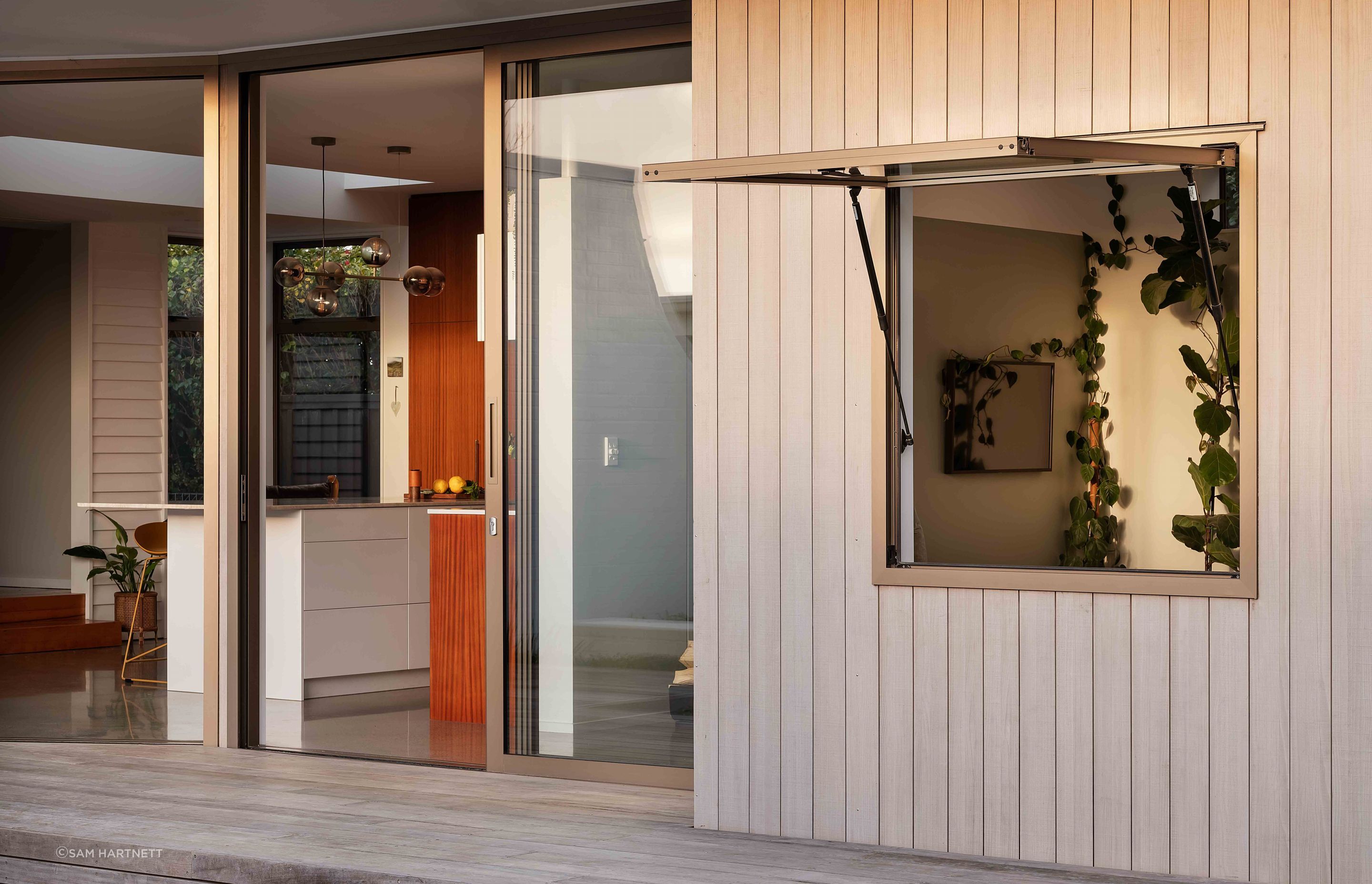 There's excellent indoor/outdoor flow through full-height joinery.