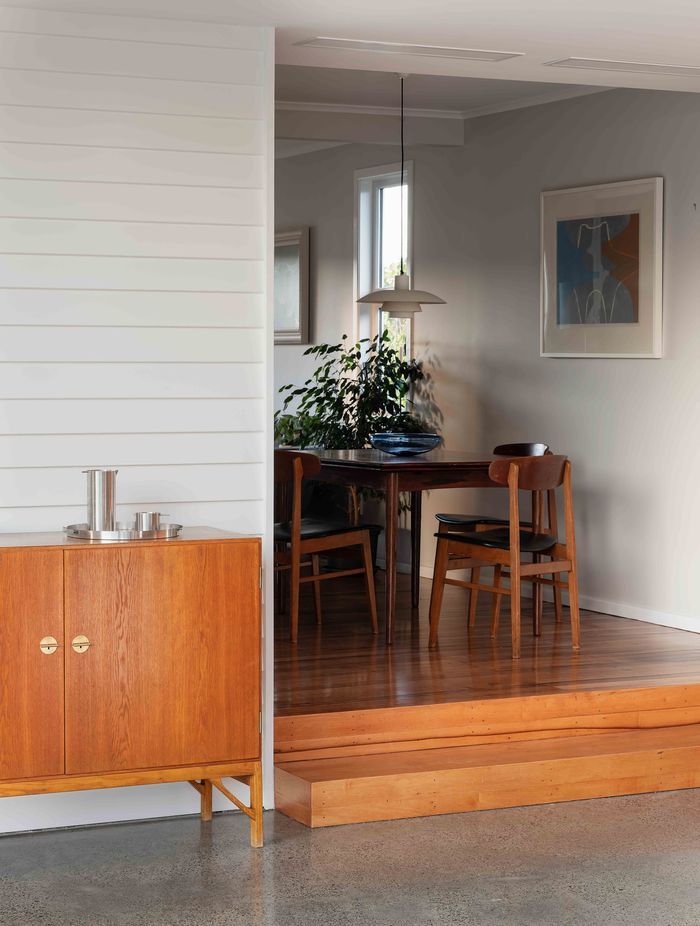 The new extension is a step down from the original house.