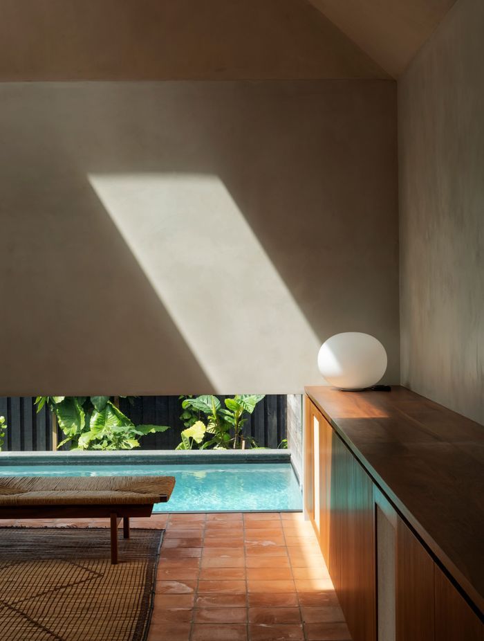 For a family with three young children, the extension opens out to space for a courtyard and pool area.