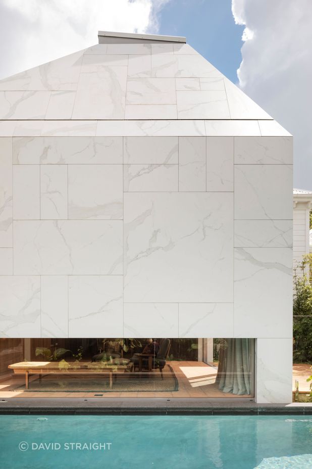 The porcelain tile cladding is a unique choice. “We thought we'd work with all the available off-the-shelf tile formats and mix them up in an interesting pattern. It really relied on having a little bit of adjustment in the installation.”