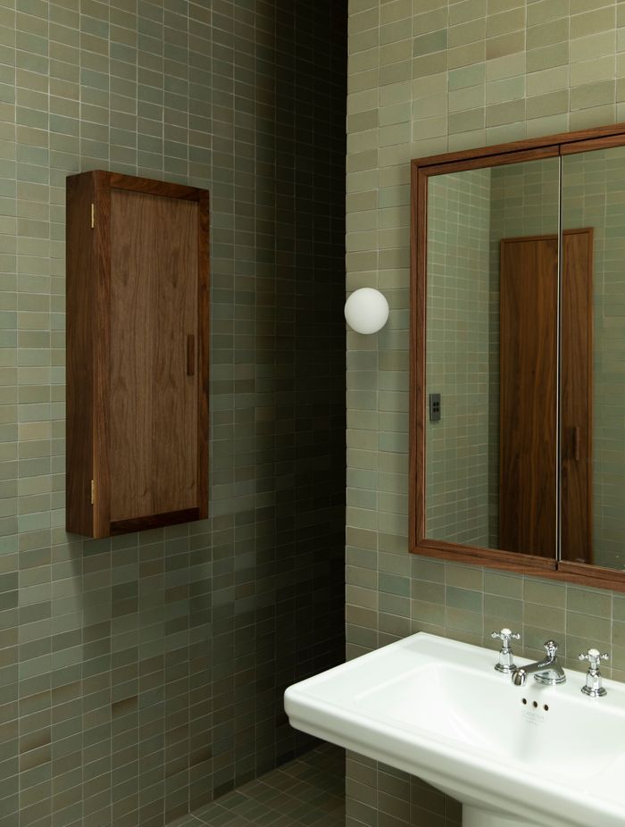 One of the home’s bathrooms. The renovation kept the entirety of the old villa but a lot of work went into making the most of every space. “There's quite a bit of planning and organisation just to fit everything in.”