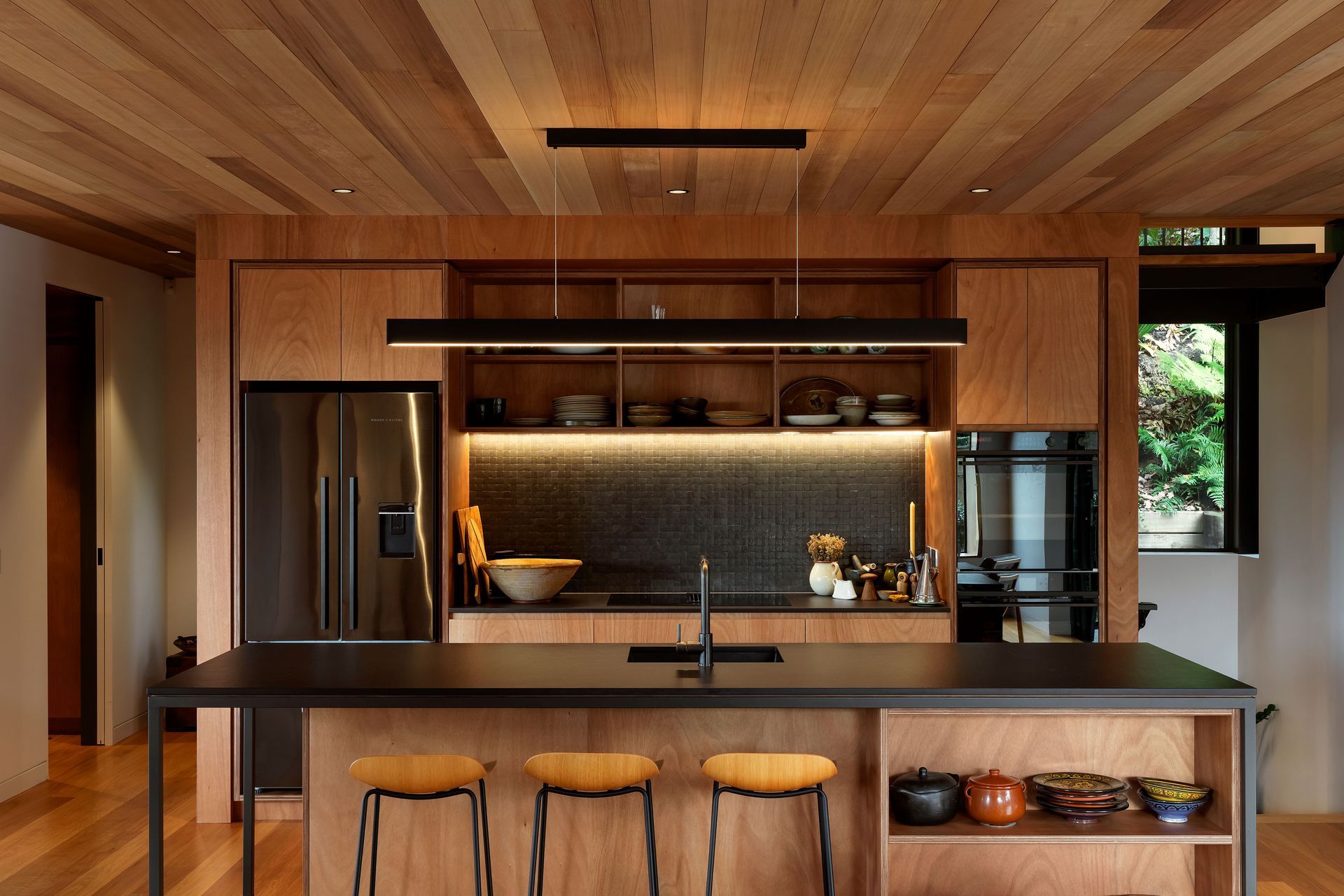 Every part of the house is carefully considered and the kitchen is at the centre, with treasured ceramic pieces collected overseas on display. “The quality of the spaces was really paramount as we were working with a relatively small floor area.”