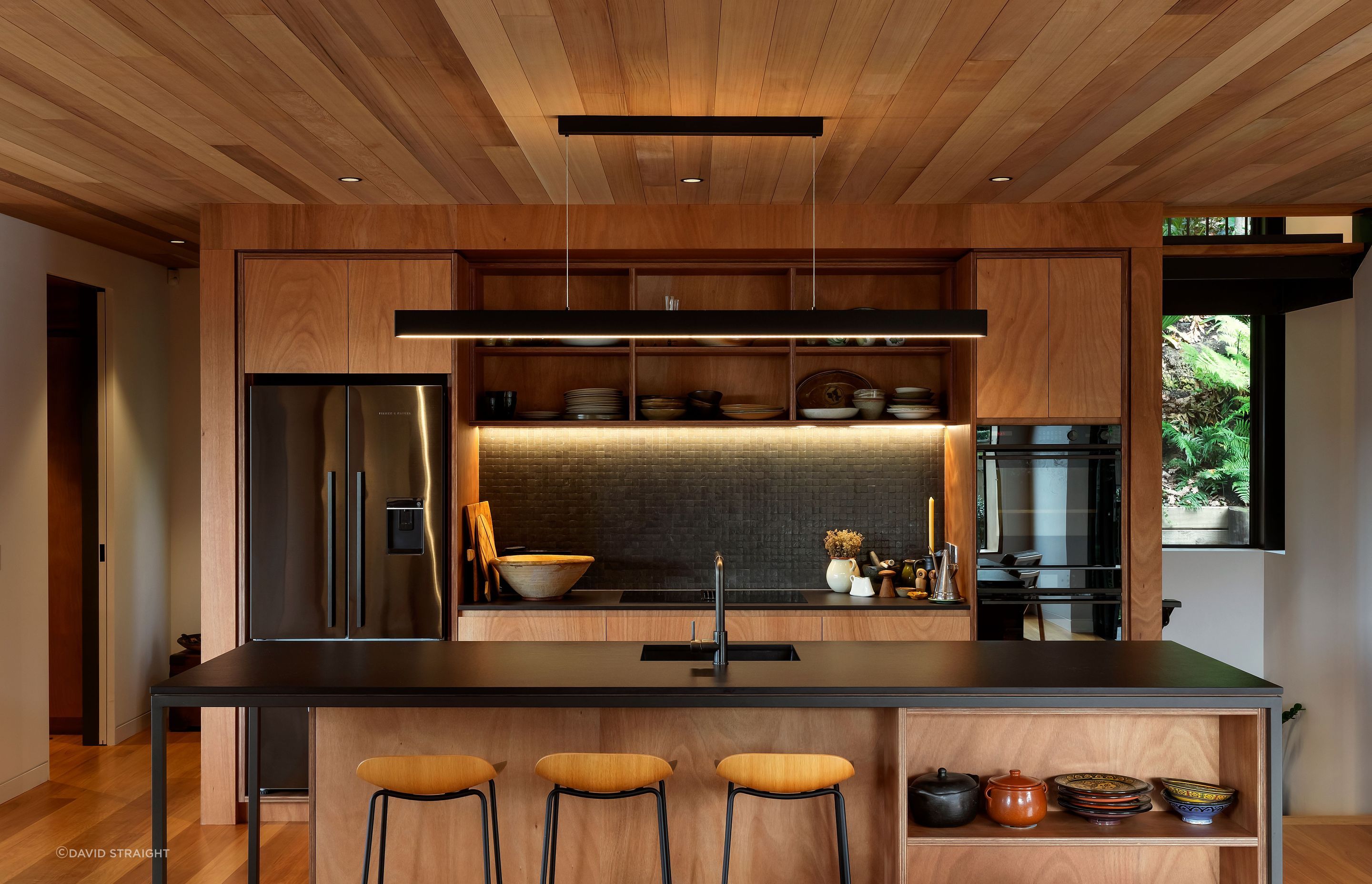 Every part of the house is carefully considered and the kitchen is at the centre, with treasured ceramic pieces collected overseas on display. “The quality of the spaces was really paramount as we were working with a relatively small floor area.”