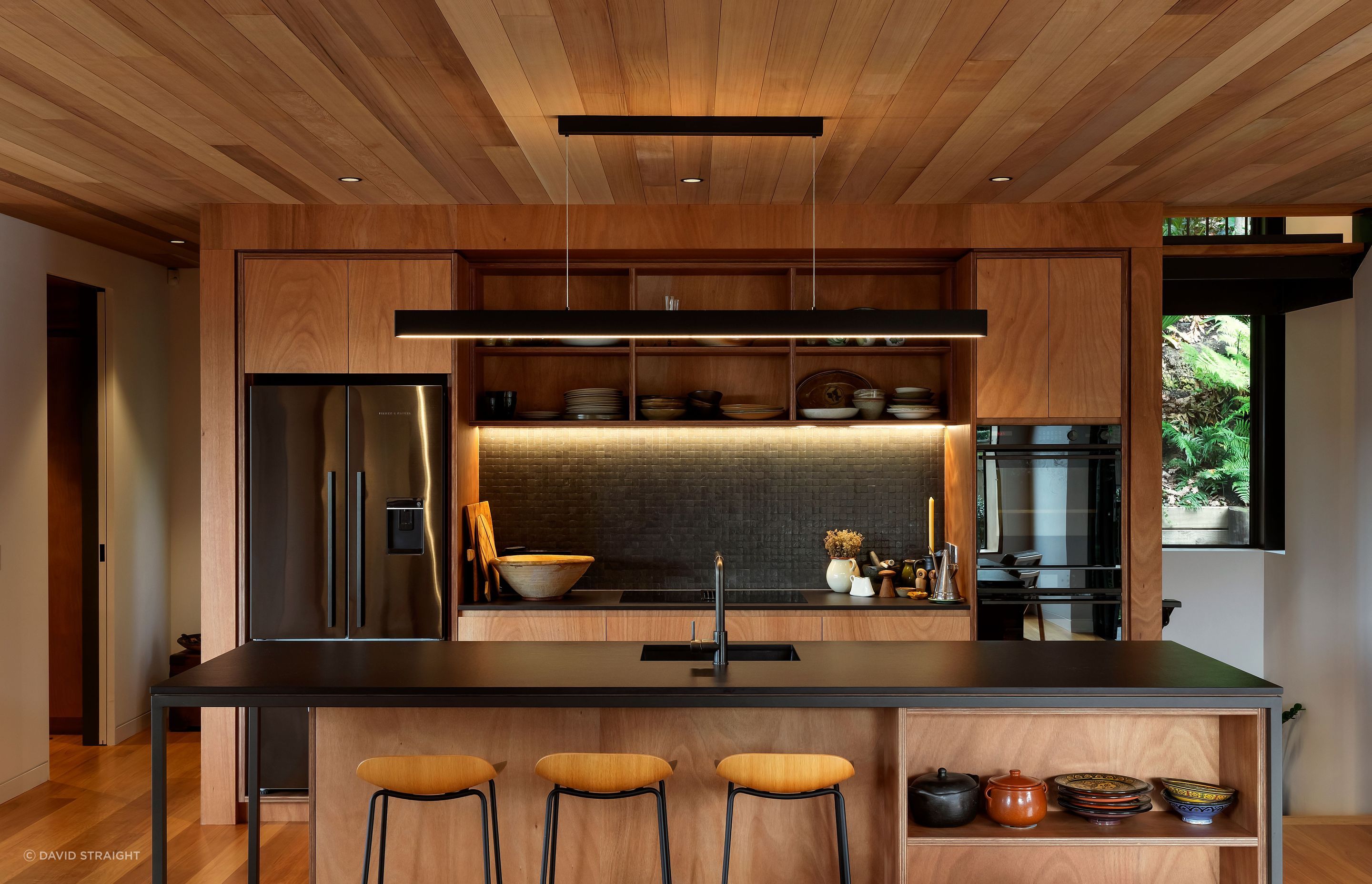 Every part of the house is carefully considered and the kitchen is at the centre, with treasured ceramic pieces collected overseas on display. “The quality of the spaces was really paramount as we were working with a relatively small floor area.”