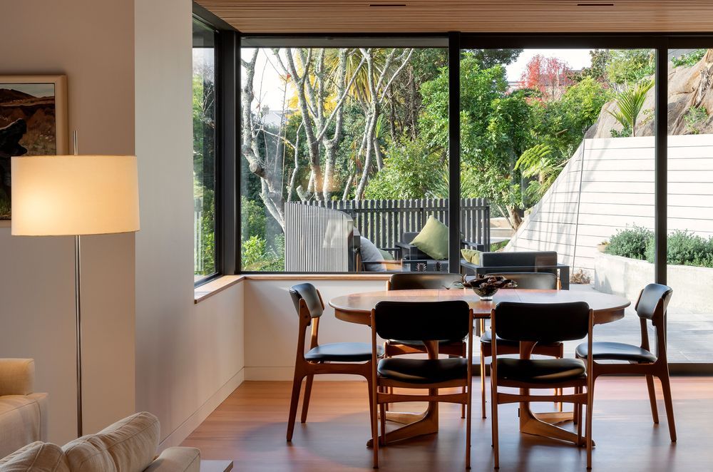 The dining area opens to the morning terrace. Hamish took care to proportion the main living space so it didn’t feel uncomfortably large. “We were wanting to define the various areas really well, and create connections with view lines to the outside.”