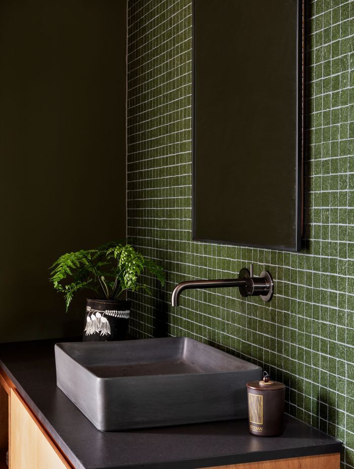 The Buddy wall mount mixer and Lux vessel basin by Concrete Nation are from Plumbline.