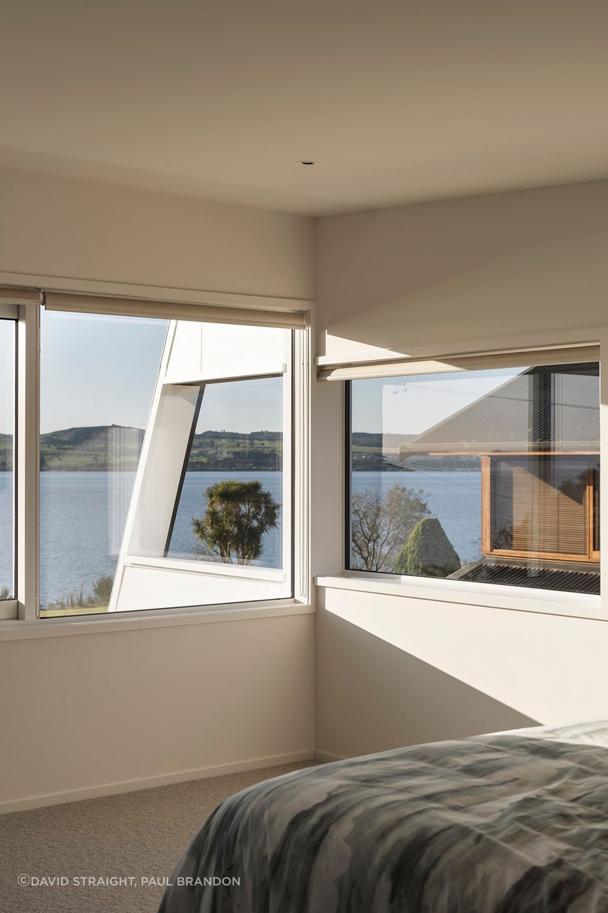 The second bedroom enjoys elevated views over the lake.