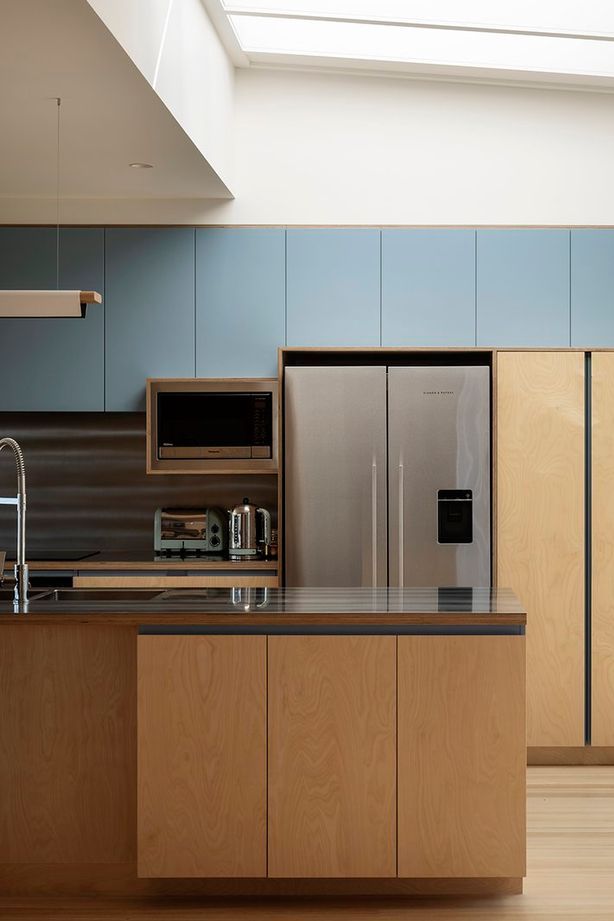 The light-filled residence has a calming, joyful spatial experience.