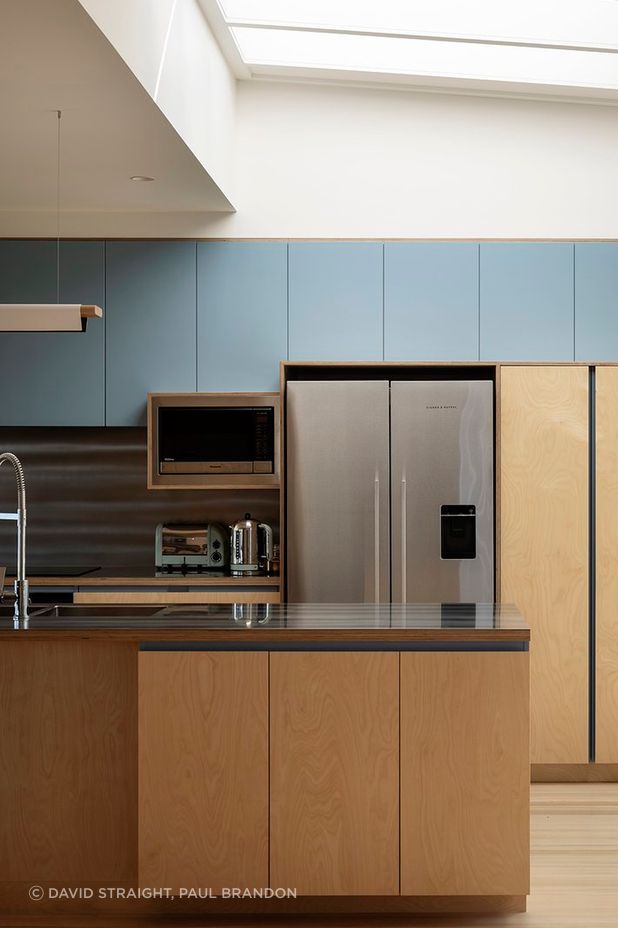 The light-filled residence has a calming, joyful spatial experience.