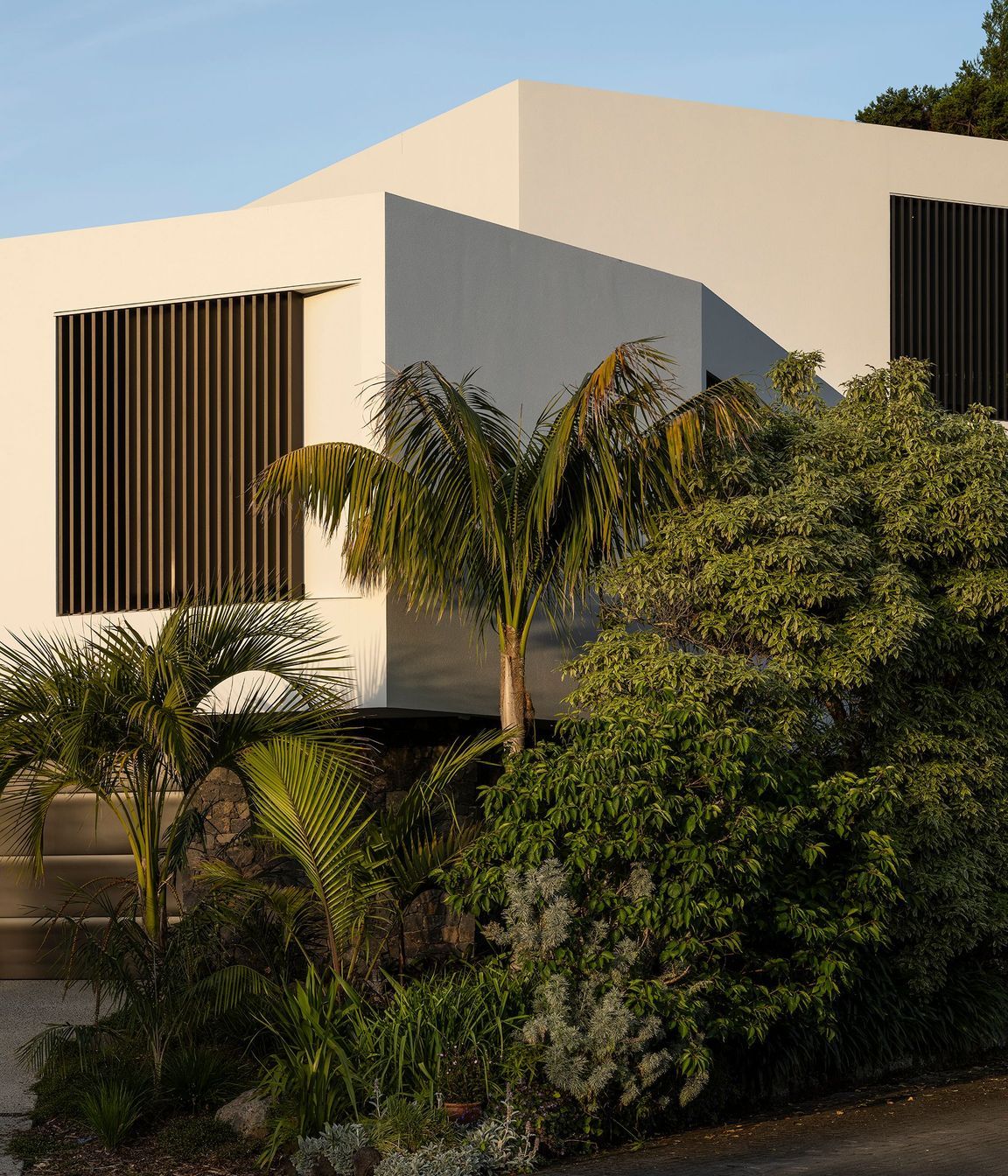 The sculptural street frontage belies the complexity and size of the home.