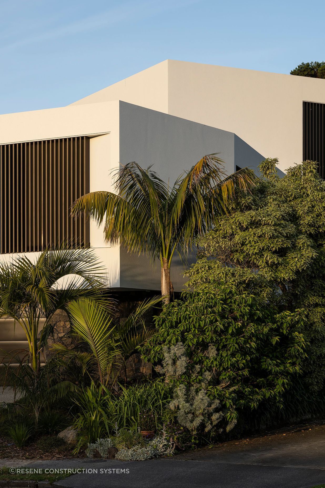 The sculptural street frontage belies the complexity and size of the home.