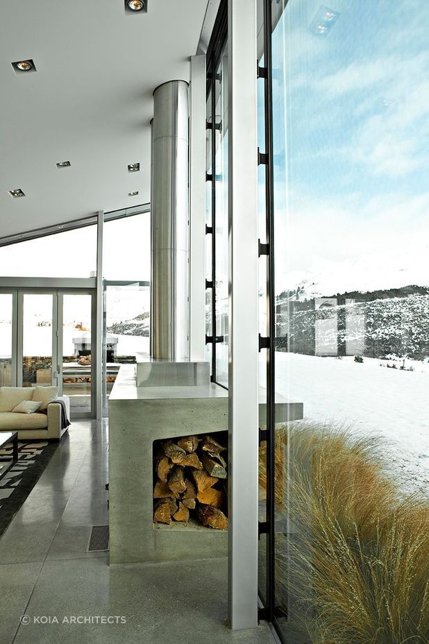 An innovative use of a farm trough with this stylish fireplace.