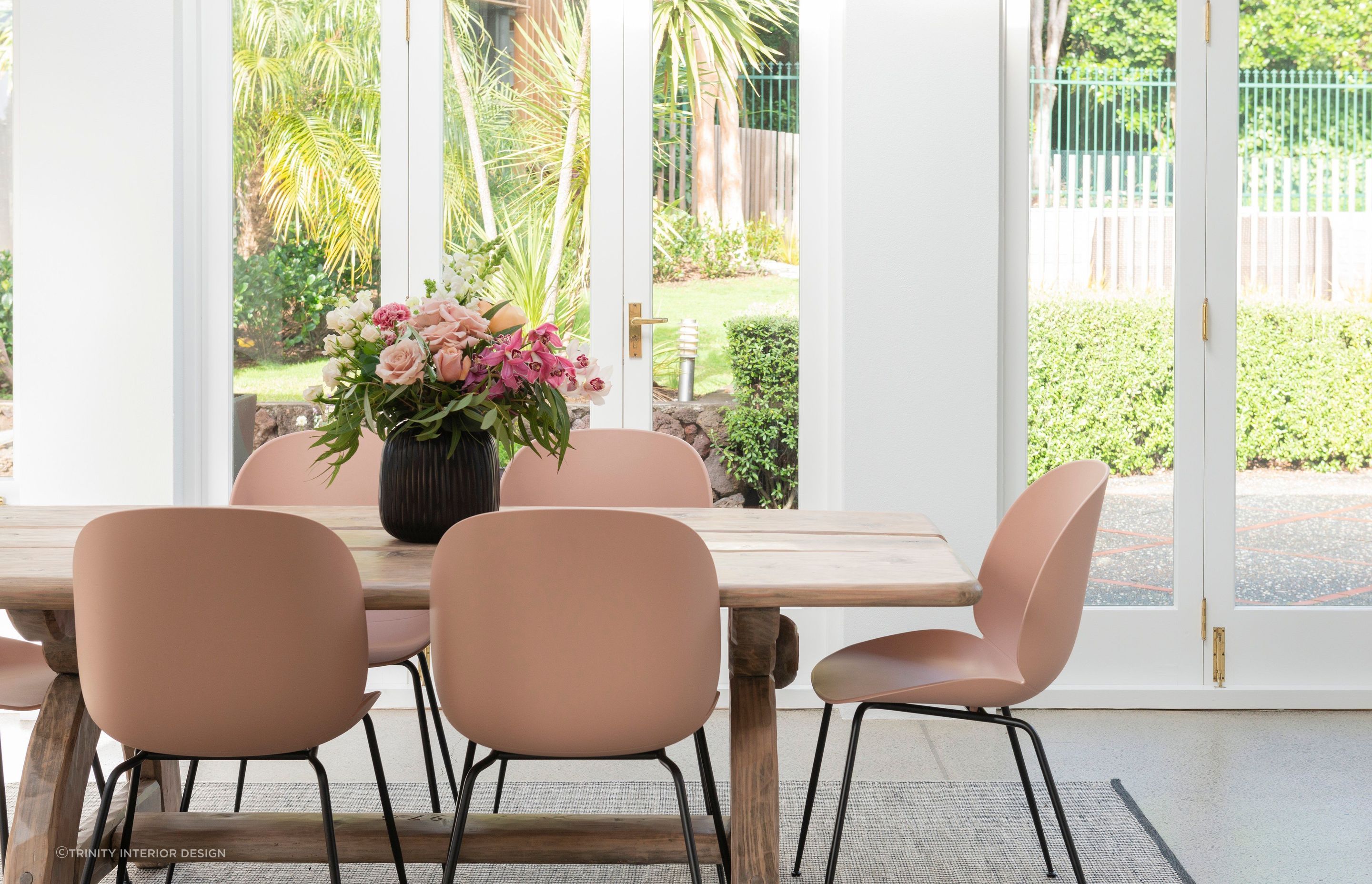 Natural materials and pastel colours create a warm and inviting atmosphere in this stylish dining room