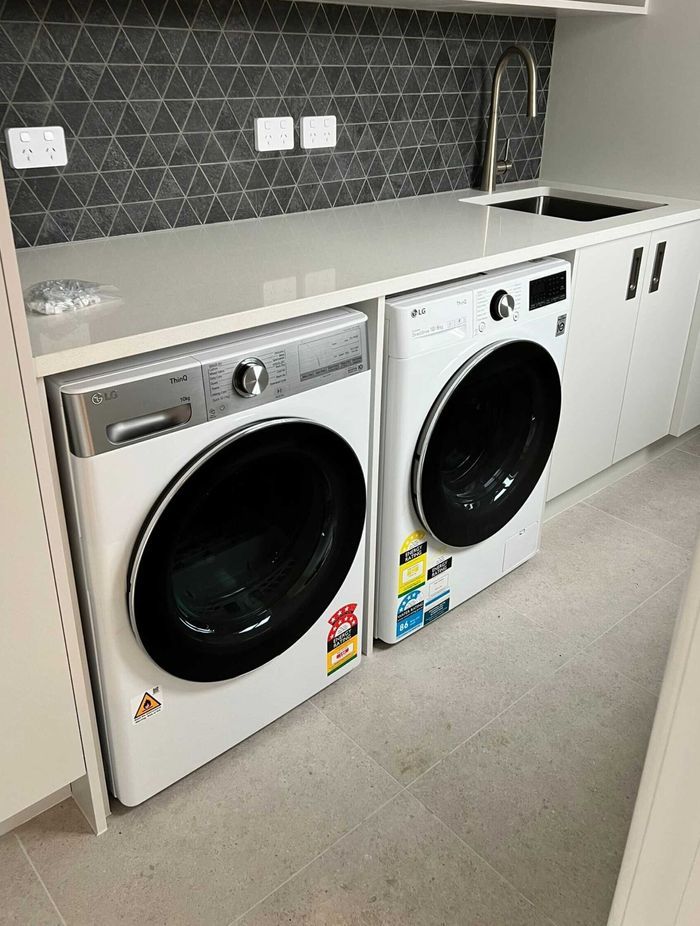 BIM Projects Limited renovated the laundry with a new layout, flooring and cabinetry.