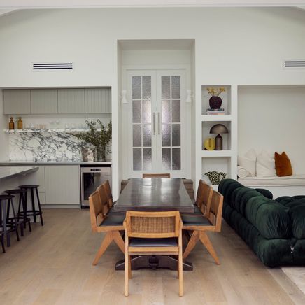 A collaboration between leading architecture and interior design practices, this elegant bungalow renovation creates space for a family to grow