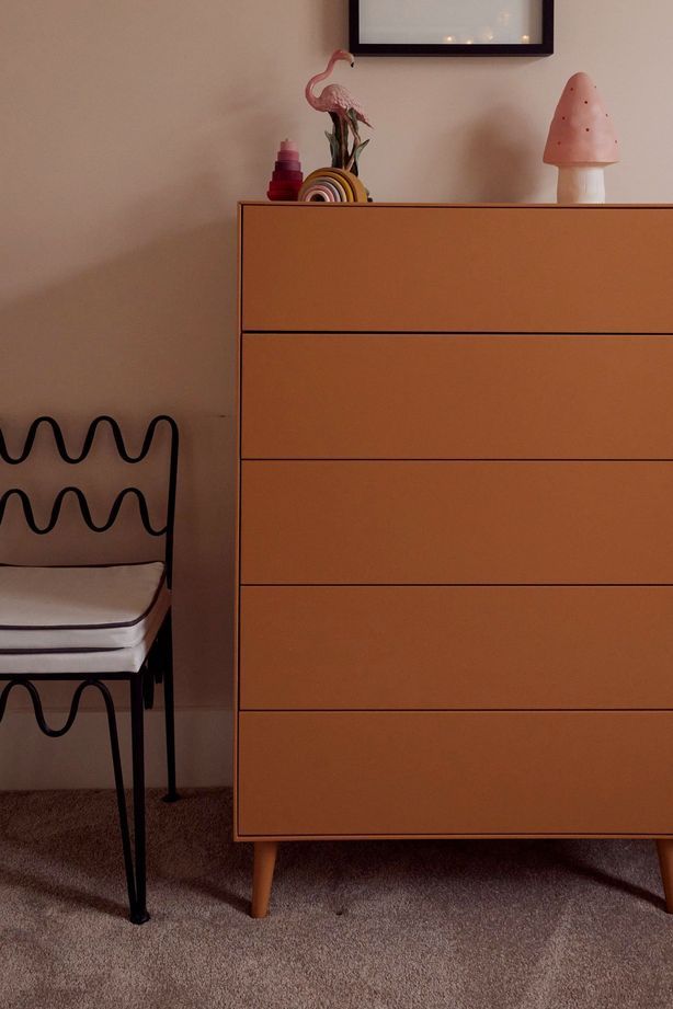 Dusky pink complements the home's soft, neutral colour palette.